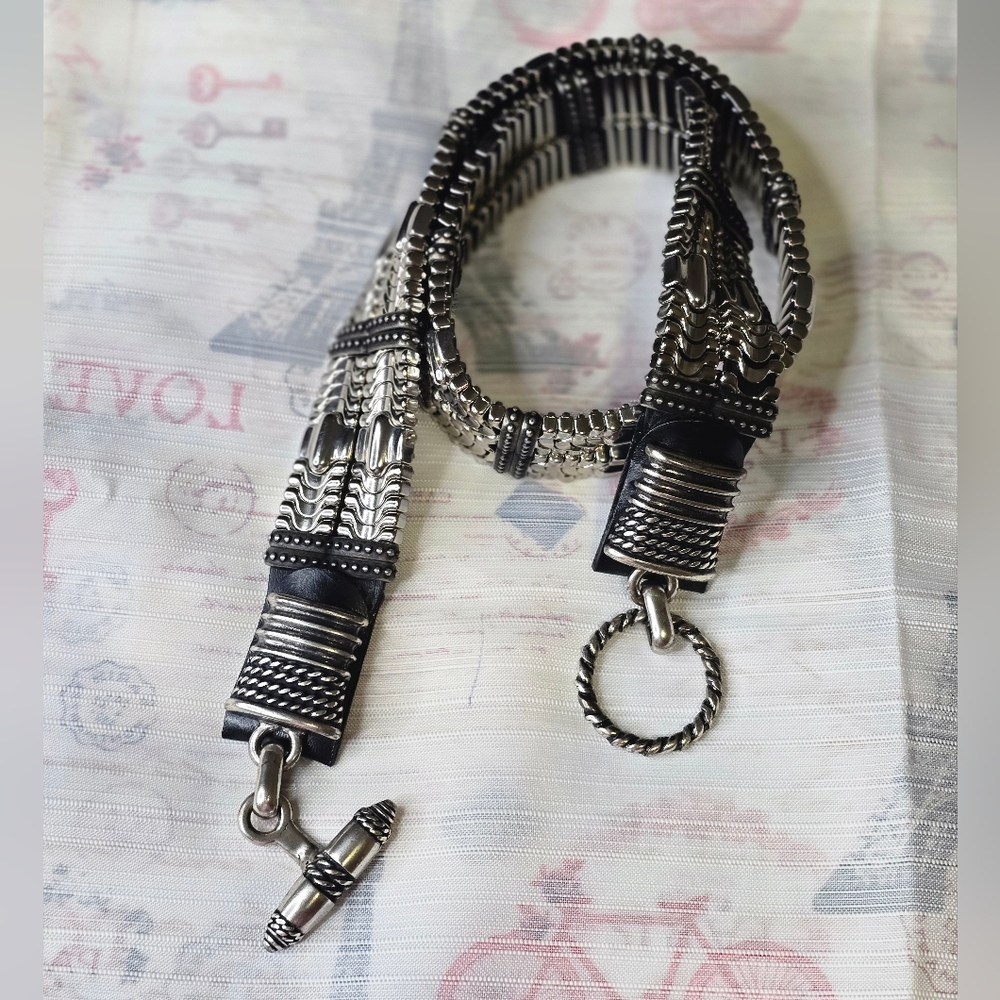 Vintage Brave metal and leather belt. 30".